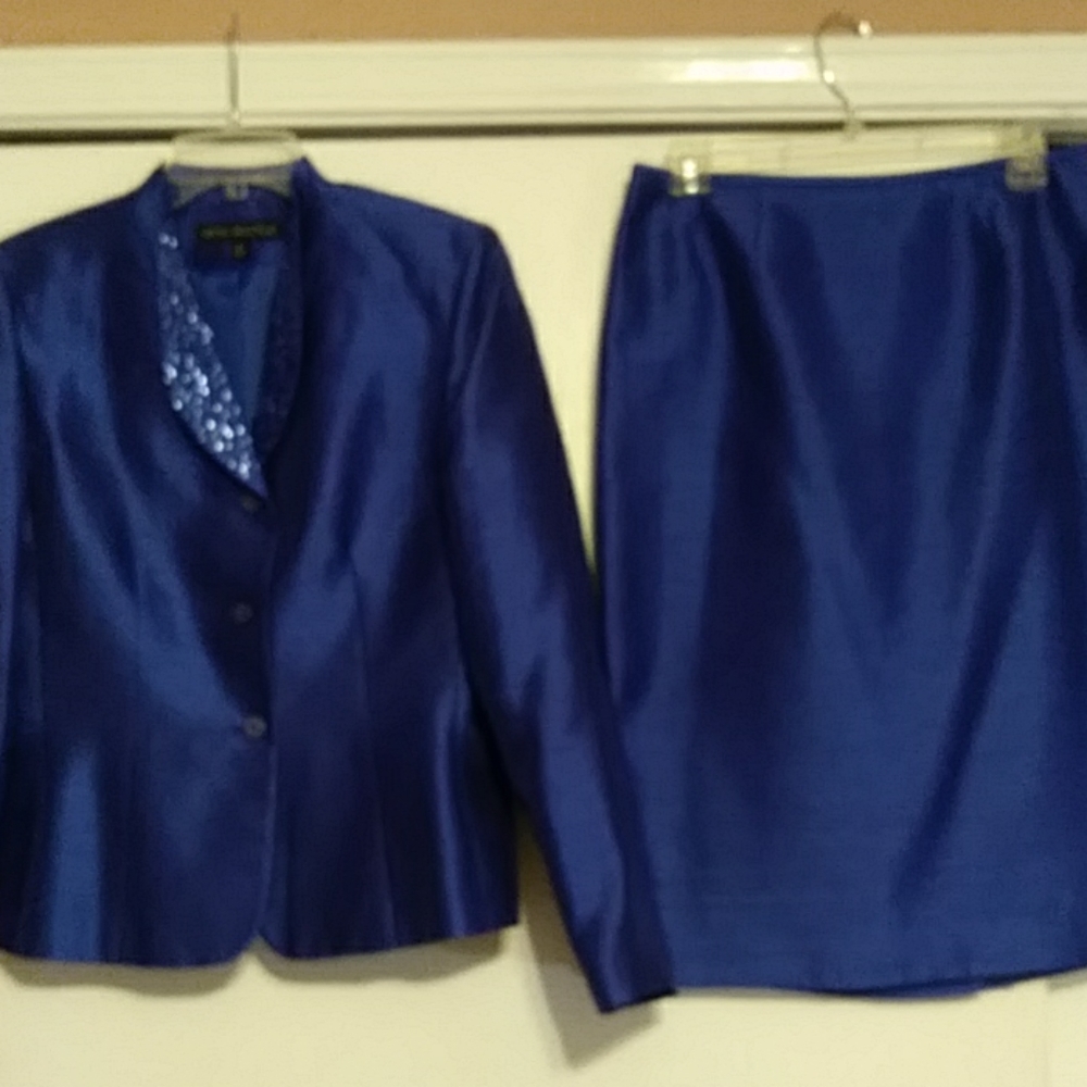 Classy blue suit. Perfect for a formal event.